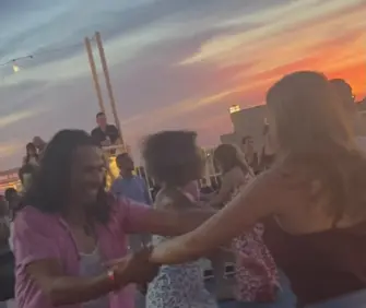 Festa di Danza Salsa al Tramonto sul Tetto