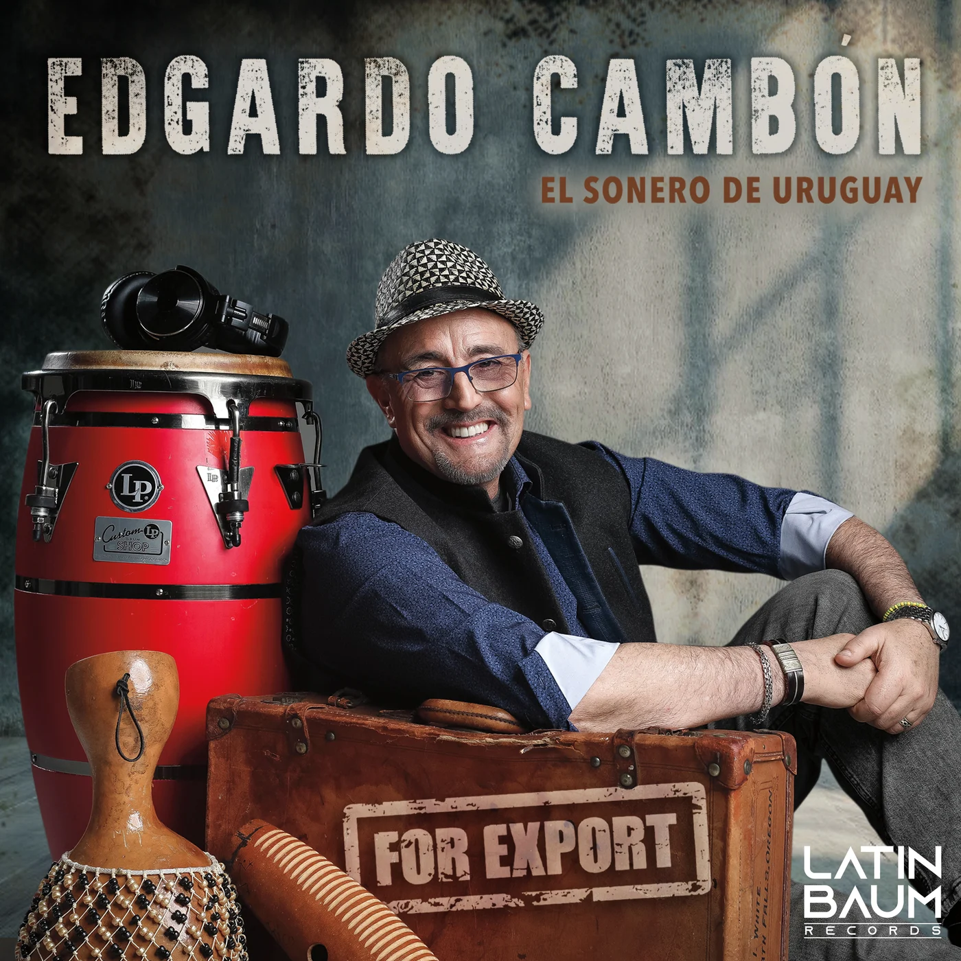 For Export album cover showing Edgardo Cambón beside a red conga drum and a vintage suitcase